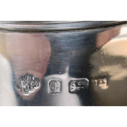 265 - A George V silver mug, and a pair of silver cup holders, various dates and marks, 6.7 ozt (3)