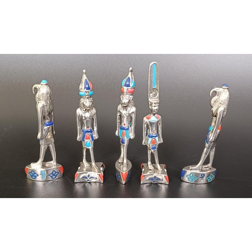 269 - A set of five Egyptian style silver coloured metal and enamel figures, 6 cm