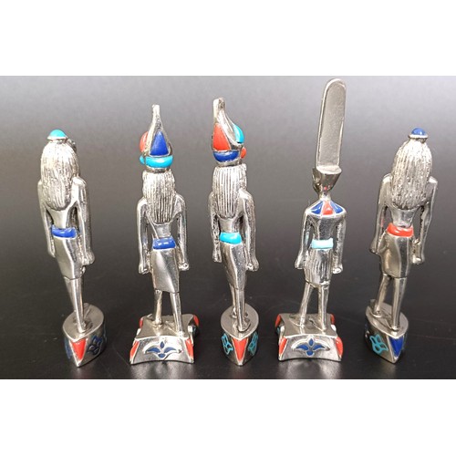 269 - A set of five Egyptian style silver coloured metal and enamel figures, 6 cm