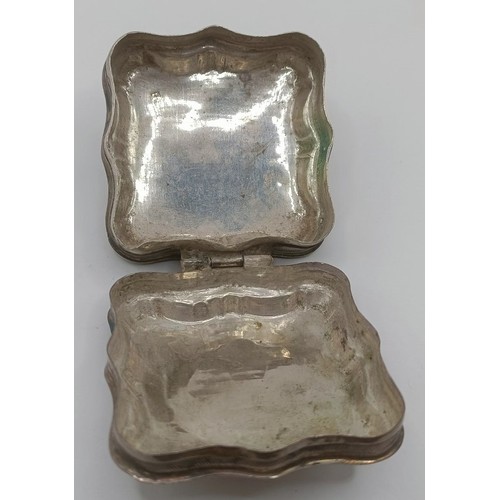 271 - A George V silver kidney shaped box, and two other boxes, various dates and marks, 1.9 ozt (3)