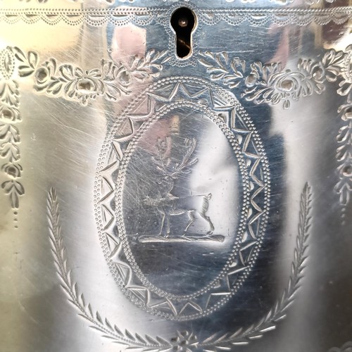 406 - A Victorian silver oval tea caddy, with engraved decoration, London 1856, 11.6 ozt, 11 cm wide