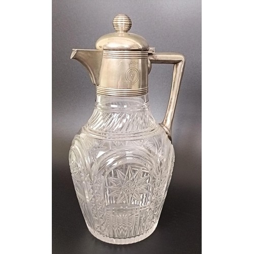 408 - An Austrian cut glass claret jug, with silver mount and handle, 25 cm high