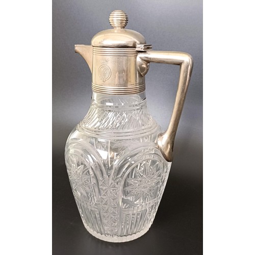 408 - An Austrian cut glass claret jug, with silver mount and handle, 25 cm high