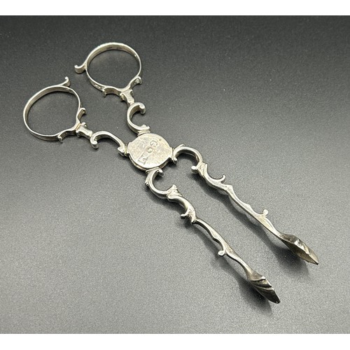 274 - A pair of 18th century silver tongs, initialled, handles marked, 34.5 g