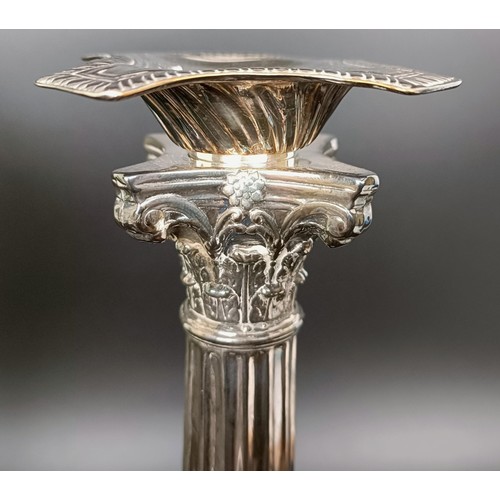 410 - A pair of silver plated candlesticks, in the form of Corinthian columns, 35 cm high (2)