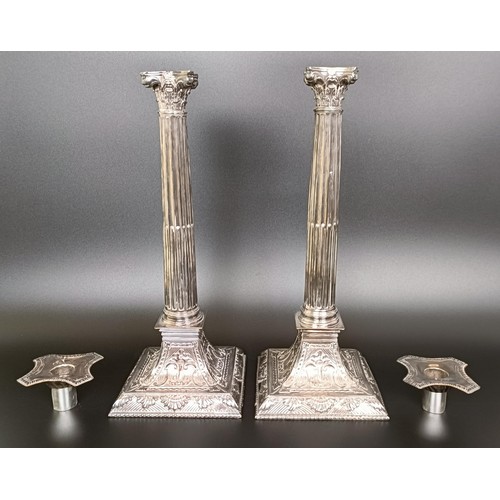 410 - A pair of silver plated candlesticks, in the form of Corinthian columns, 35 cm high (2)