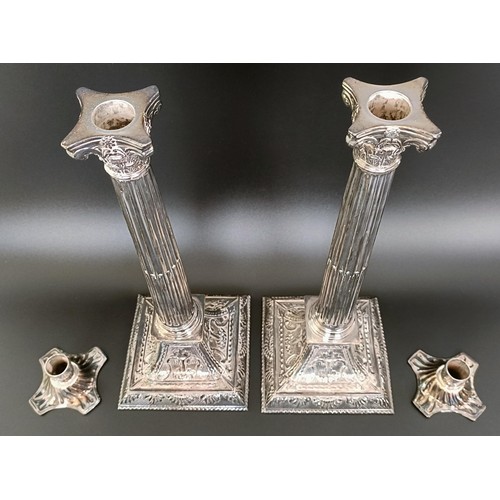 410 - A pair of silver plated candlesticks, in the form of Corinthian columns, 35 cm high (2)