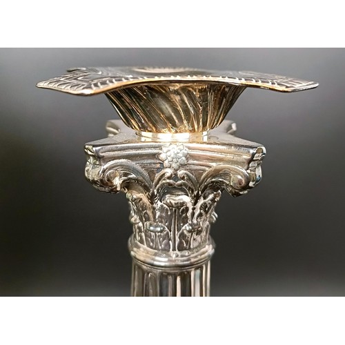 410 - A pair of silver plated candlesticks, in the form of Corinthian columns, 35 cm high (2)