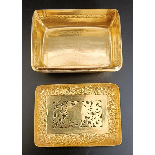 291 - A George IV silver gilt snuff box, with pierced and embossed decoration, initialled, Paul Storr, Lon... 