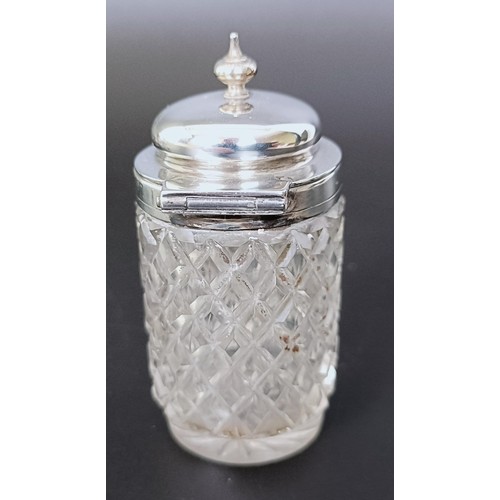 310 - A Victorian silver cruet stand, London 1894, 6.53 ozt, and two silver mounted condiment jars (3)