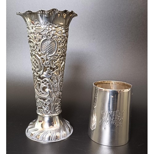 312 - A George V silver mug, and a pierced silver posy vase, 7.1 ozt (2)