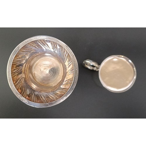 312 - A George V silver mug, and a pierced silver posy vase, 7.1 ozt (2)