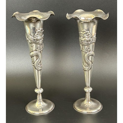 2 - A pair of Chinese silver coloured metal vases, decorated dragons, 9.4 ozt, 22 cm high (2)