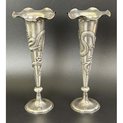 2 - A pair of Chinese silver coloured metal vases, decorated dragons, 9.4 ozt, 22 cm high (2)...