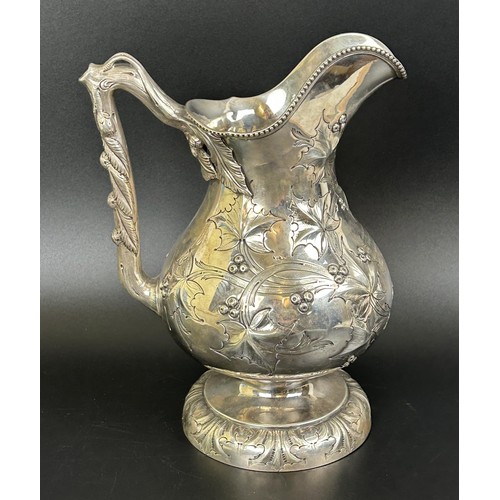 4 - An American silver coloured metal jug, inscribed Presented to Officers and Employees of Penn State L... 