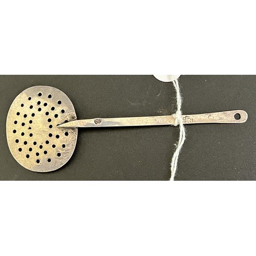 41 - An 18th century Dutch silver coloured metal straining spoon...