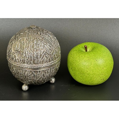 46 - A Persian silver coloured metal string box, 10 cm high