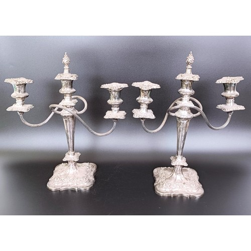 340 - A pair of silver plated candelabra, 38 cm high (2)