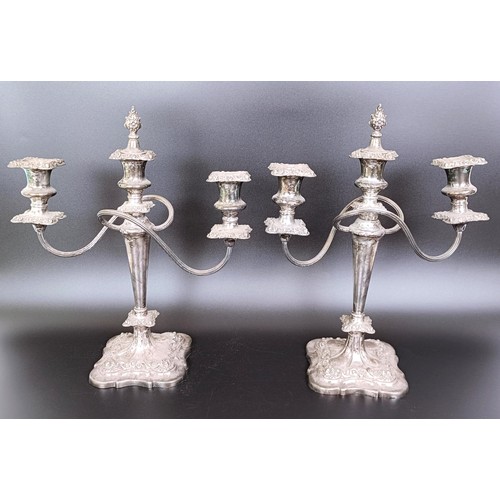 340 - A pair of silver plated candelabra, 38 cm high (2)