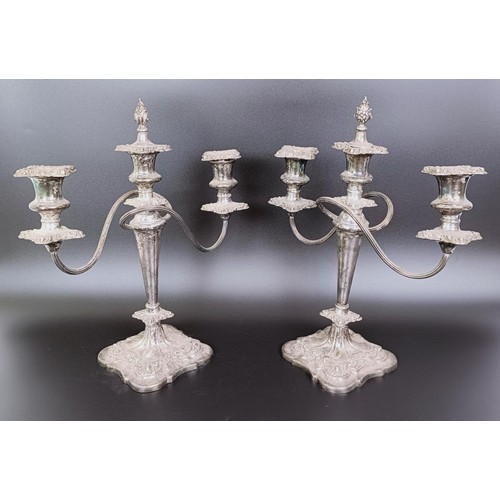 340 - A pair of silver plated candelabra, 38 cm high (2)