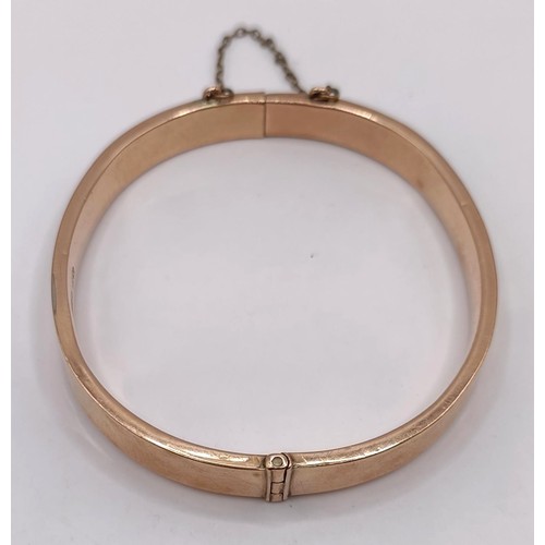 800 - A 9ct gold bangle, 9.3 g