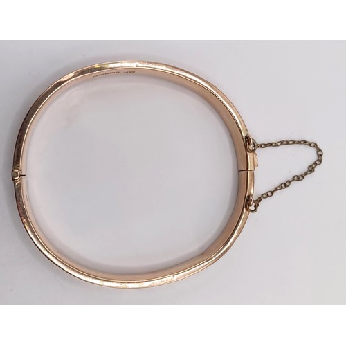 800 - A 9ct gold bangle, 9.3 g