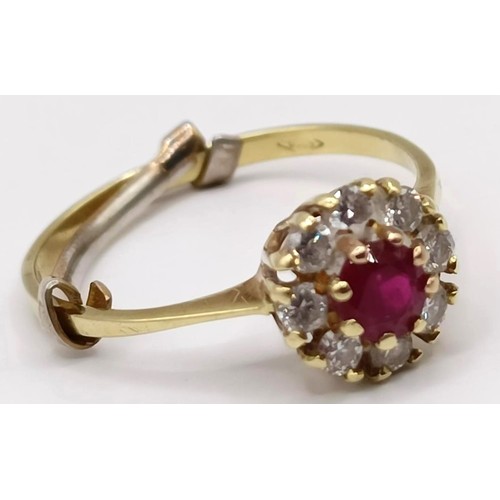 751 - An 18ct gold, ruby and diamond cluster ring, ring size K