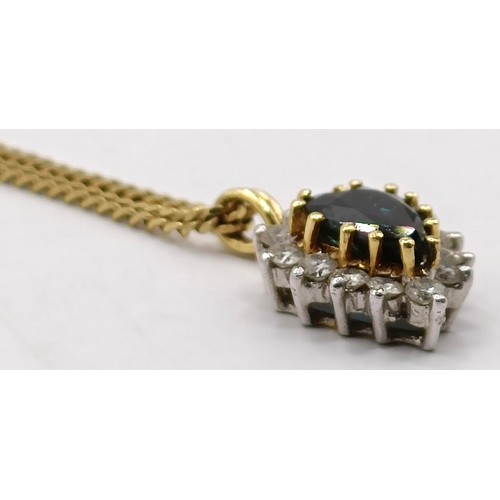 807 - A sapphire and diamond pendant, on a 9ct gold chain