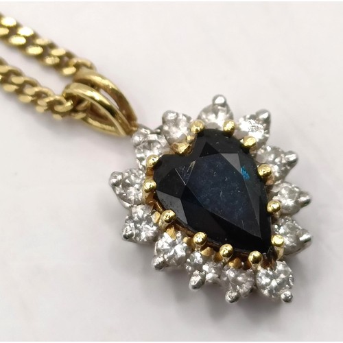 807 - A sapphire and diamond pendant, on a 9ct gold chain