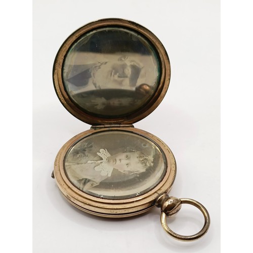 808 - Photographic Interest: An unusual mid Victorian memorial brooch, with two hinged covers, one reveali... 