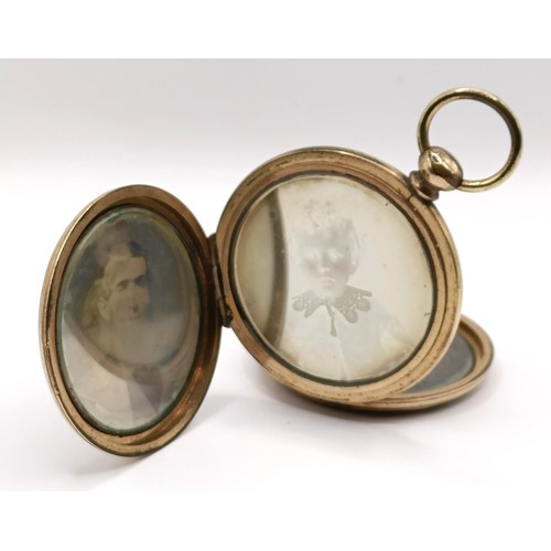 808 - Photographic Interest: An unusual mid Victorian memorial brooch, with two hinged covers, one reveali... 