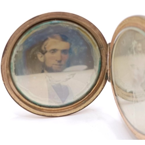 808 - Photographic Interest: An unusual mid Victorian memorial brooch, with two hinged covers, one reveali... 