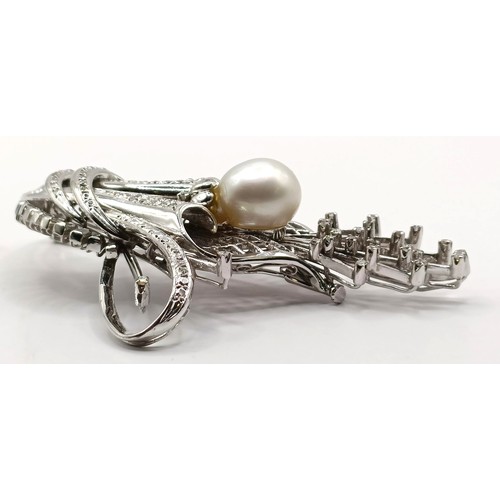 736 - An 18ct white gold, diamond and pearl brooch