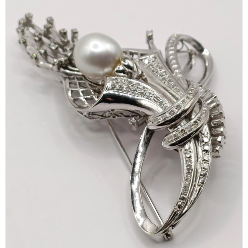 736 - An 18ct white gold, diamond and pearl brooch