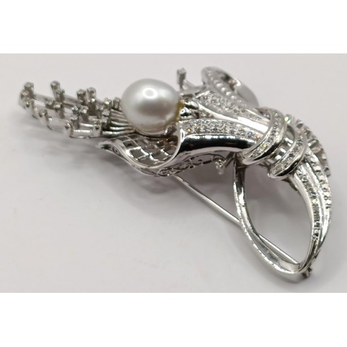 736 - An 18ct white gold, diamond and pearl brooch