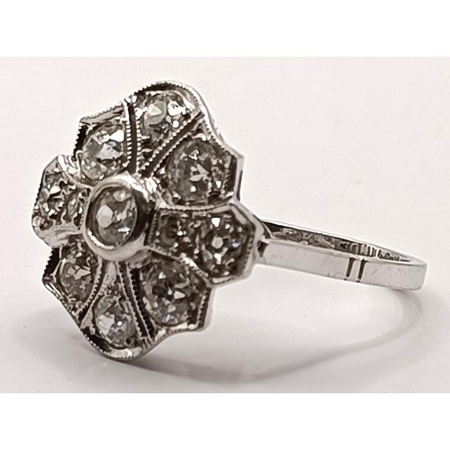 809 - An Art Deco style platinum and diamond cluster ring, ring size N, in a vintage jewellery box