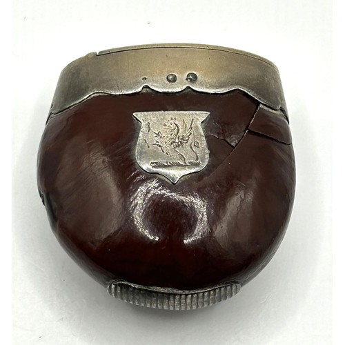 302 - A Victorian vesta case, with silver mounts, crested and monogrammed, Birmingham 1884, 4 cm high