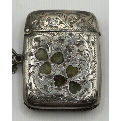 296 - A George V silver vesta case, set hardstone shamrocks, Chester 1919, 25.4 g (all in), 4.5 cm high