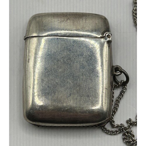 296 - A George V silver vesta case, set hardstone shamrocks, Chester 1919, 25.4 g (all in), 4.5 cm high