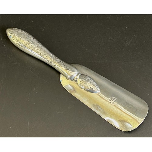 316 - An American silver shoe horn, initialled, 2.1 ozt