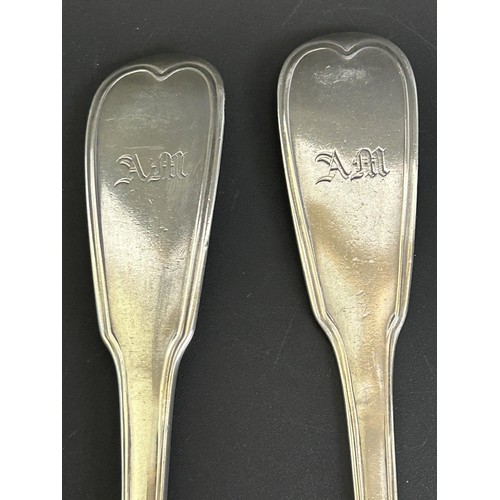 325 - A pair of Continental silver coloured metal basting spoons, initialled, and another similar pair, 17... 