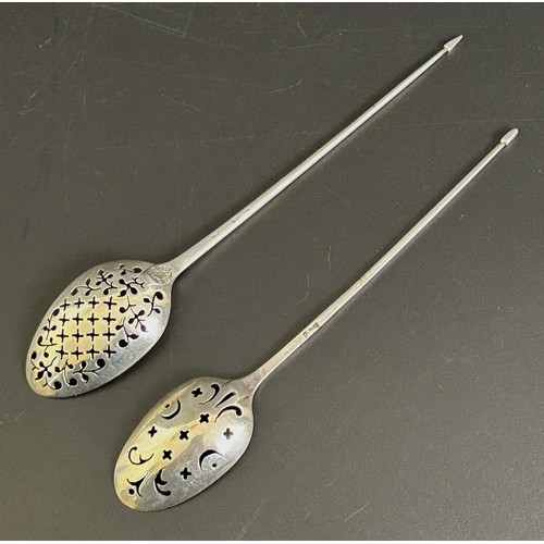 378 - An 18th century silver moat spoon, marks rubbed, and another (2)