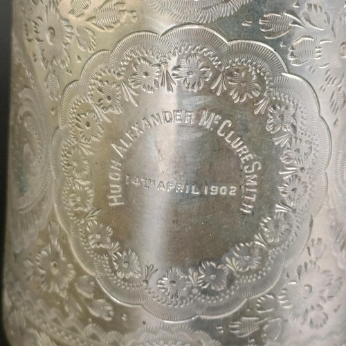 183 - An Edward VII silver mug, with engraved decoration, inscribed and dated, Sheffield 1901, 4.2 ozt, 7.... 