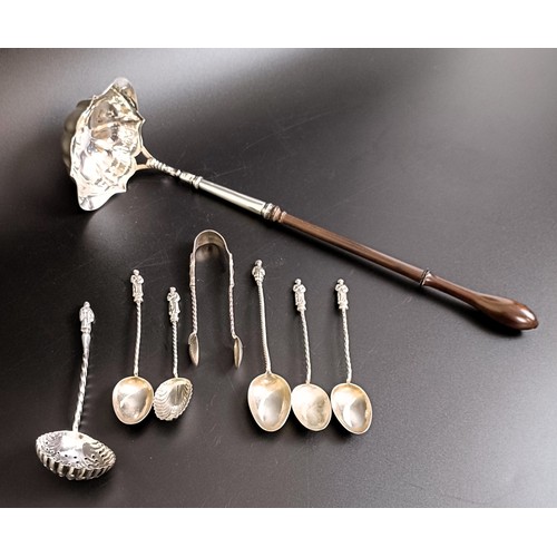 110 - A George III silver toddy ladle, with a turned wooden handle, and assorted silver coloured metal spo... 