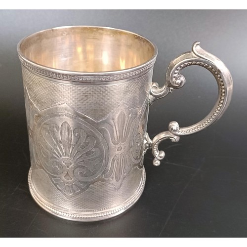 187 - A Victorian silver mug, with engine turned decoration, inscribed and dated, London 1871, 6.1 ozt, 10... 