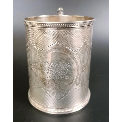 187 - A Victorian silver mug, with engine turned decoration, inscribed and dated, London 1871, 6.1 ozt, 10... 