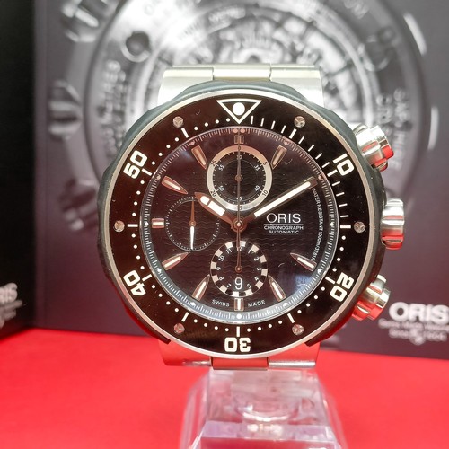 916 - A gentleman's titanium Oris Chronograph Automatic wristwatch, 1000m, boxed with product manual and g... 