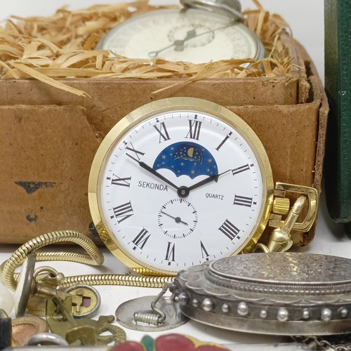 840 - A Jaeger-LeCoultre eight day travel clock, an oval silver locket on a chain, a pocket barometer, a s... 