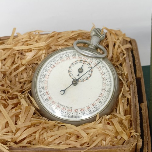 840 - A Jaeger-LeCoultre eight day travel clock, an oval silver locket on a chain, a pocket barometer, a s... 