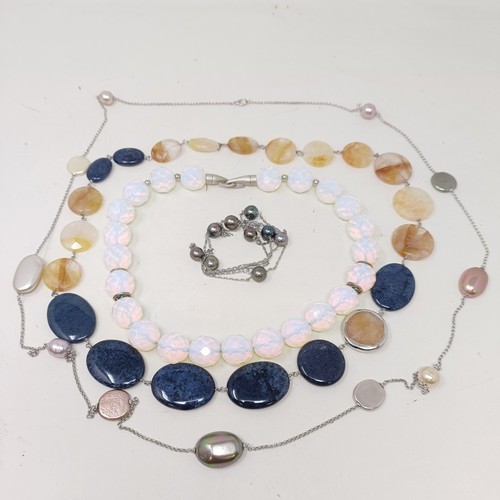 836 - A simulated opal bead necklace, a blue and amber coloured stone bead necklace, and two other necklac... 